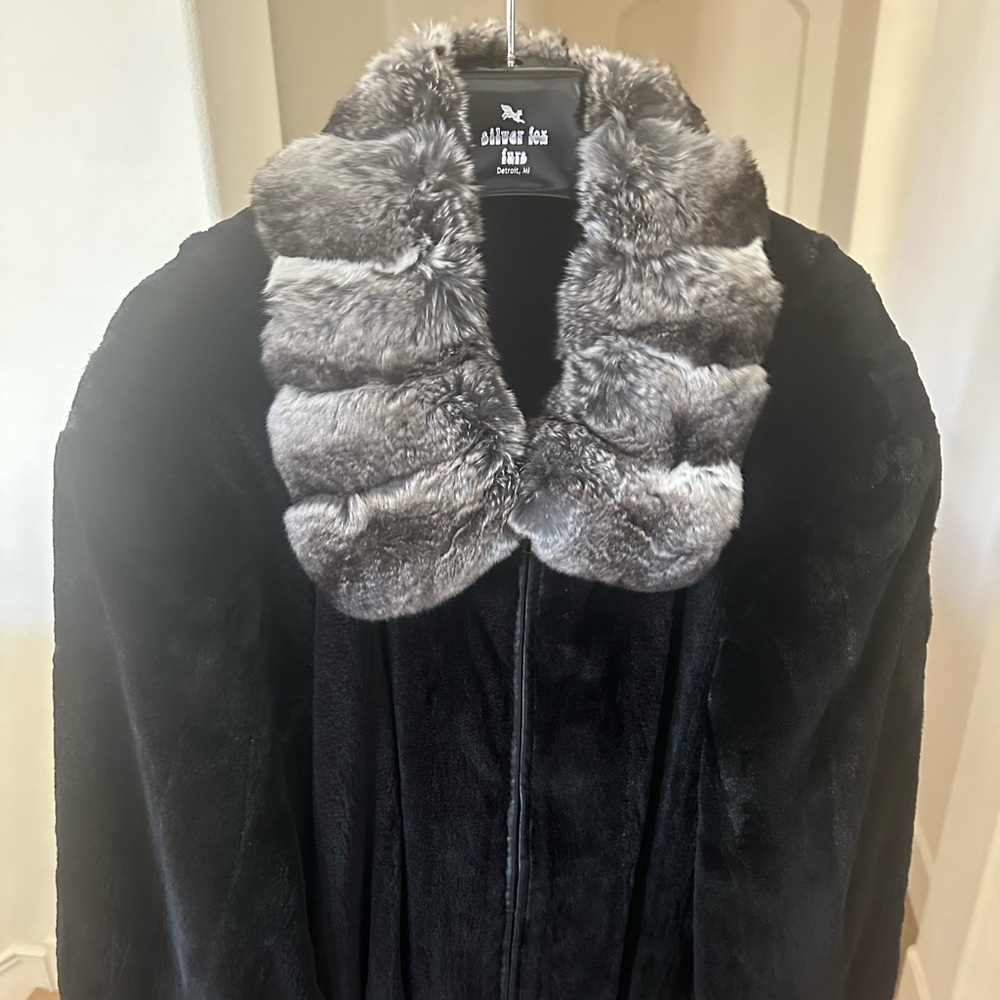 Large Mink Coat with matching hat. Received as a gift Never worn.